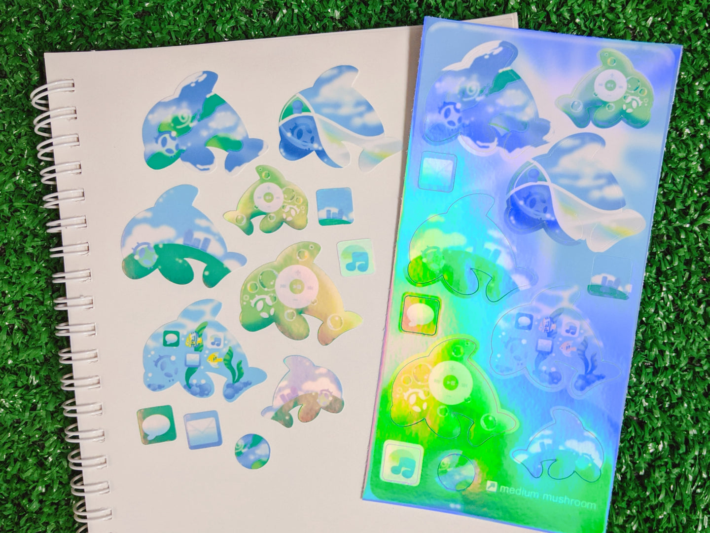utopian dolphin pod holographic sticker sheet