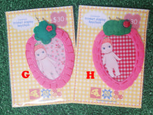 Load image into Gallery viewer, strawberry baby carrier [trinket display keychain]
