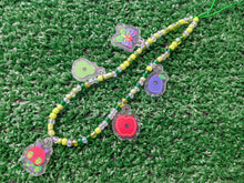 Load image into Gallery viewer, A beaded phone charm with colorful fruit-shaped charms, including a red apple, green pear, purple plum, a nostalgic picture book caterpillar character, and a nostalgic butterfly character
