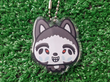 Load image into Gallery viewer, acrylic keychain showing a silly drawing of a creepypasta husky character smiling, showing silver chain and clear glossy epoxy coating

